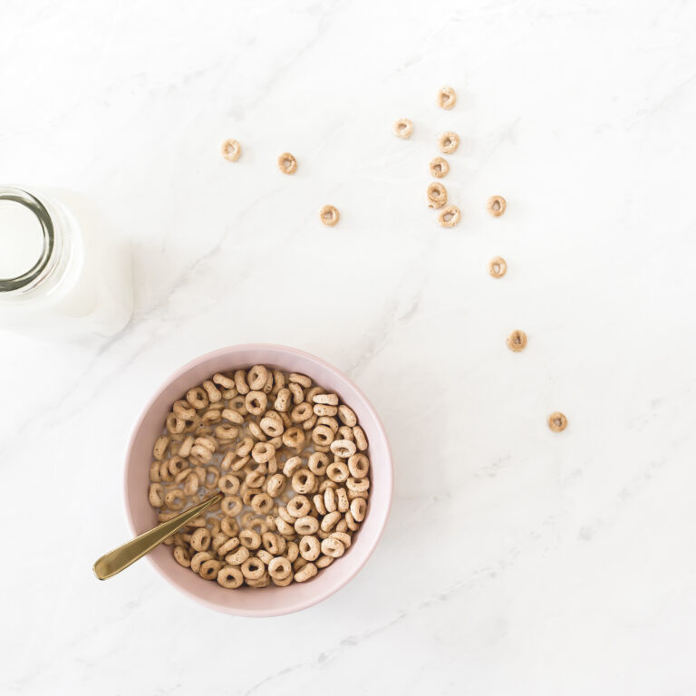 cheerios in a pink bowl